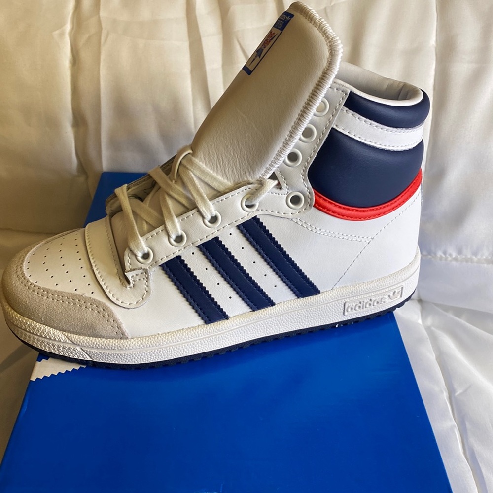 Boys Adidas’s white high top w/ blue stripes and blue and red accents on back
